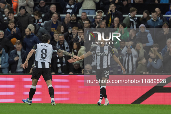 Newcastle United's Sandro Tonali celebrates with Jacob Murphy after scoring his second goal during the Carabao Cup Quarter Final match betwe...