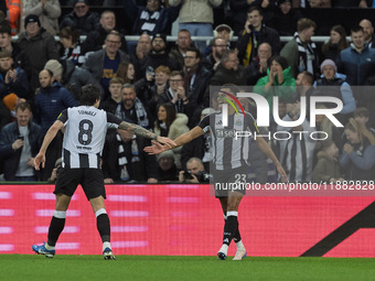 Newcastle United's Sandro Tonali celebrates with Jacob Murphy after scoring his second goal during the Carabao Cup Quarter Final match betwe...