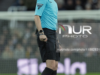 Match referee Samuel Barrott officiates during the Carabao Cup Quarter Final match between Newcastle United and Brentford at St. James's Par...