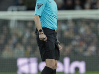 Match referee Samuel Barrott officiates during the Carabao Cup Quarter Final match between Newcastle United and Brentford at St. James's Par...