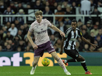 Brentford's Nathan Collins competes with Newcastle United's Alexander Isak during the Carabao Cup Quarter Final match between Newcastle Unit...