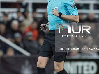 Match referee Samuel Barrott officiates during the Carabao Cup Quarter Final match between Newcastle United and Brentford at St. James's Par...