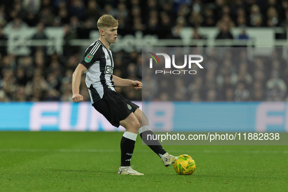 Lewis Hall of Newcastle United is seen in action during the Carabao Cup Quarter Final match between Newcastle United and Brentford at St. Ja...