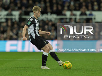 Lewis Hall of Newcastle United is seen in action during the Carabao Cup Quarter Final match between Newcastle United and Brentford at St. Ja...