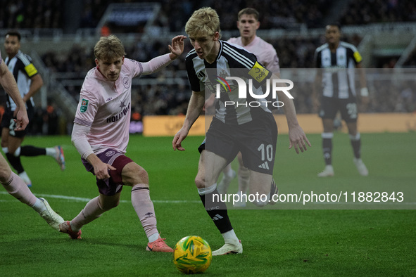 Anthony Gordon of Newcastle United plays during the Carabao Cup Quarter Final match between Newcastle United and Brentford at St. James's Pa...