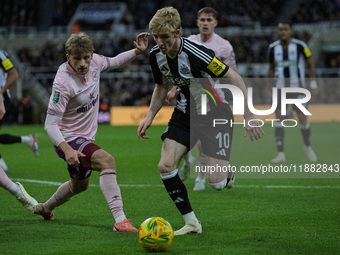 Anthony Gordon of Newcastle United plays during the Carabao Cup Quarter Final match between Newcastle United and Brentford at St. James's Pa...