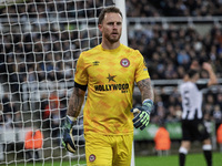 Brentford's Mark Flekken is in action during the Carabao Cup Quarter Final match between Newcastle United and Brentford at St. James's Park...