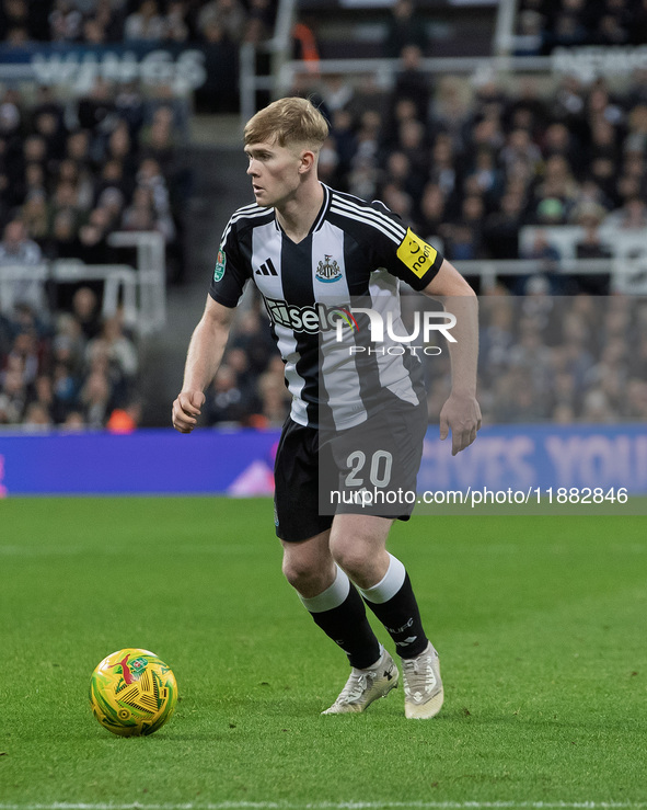 Lewis Hall of Newcastle United is seen in action during the Carabao Cup Quarter Final match between Newcastle United and Brentford at St. Ja...