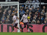 Bryan Mbeumo celebrates with Yoane Wissa after he scores during the Carabao Cup Quarter Final match between Newcastle United and Brentford a...