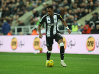 Joe Willock of Newcastle United plays during the Carabao Cup Quarter Final match between Newcastle United and Brentford at St. James's Park...