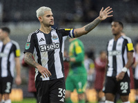 Bruno Guimaraes waves to the fans after the Carabao Cup Quarter Final match between Newcastle United and Brentford at St. James's Park in Ne...