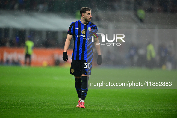 Carlos Augusto of Inter Milan looks on during the Coppa Italia Frecciarossa match between Inter Milan and Udinese Calcio at Giuseppe Meazza...