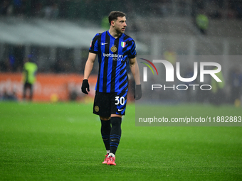 Carlos Augusto of Inter Milan looks on during the Coppa Italia Frecciarossa match between Inter Milan and Udinese Calcio at Giuseppe Meazza...