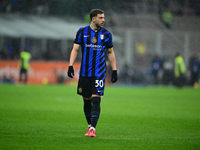 Carlos Augusto of Inter Milan looks on during the Coppa Italia Frecciarossa match between Inter Milan and Udinese Calcio at Giuseppe Meazza...