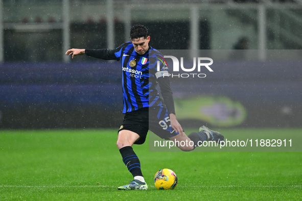 Alessandro Bastoni of Inter Milan is in action during the Coppa Italia Frecciarossa match between Inter Milan and Udinese Calcio at Giuseppe...