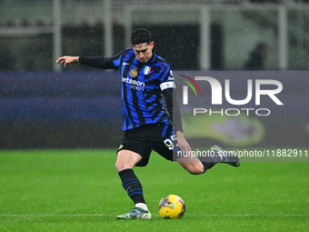 Alessandro Bastoni of Inter Milan is in action during the Coppa Italia Frecciarossa match between Inter Milan and Udinese Calcio at Giuseppe...