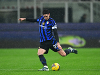 Alessandro Bastoni of Inter Milan is in action during the Coppa Italia Frecciarossa match between Inter Milan and Udinese Calcio at Giuseppe...