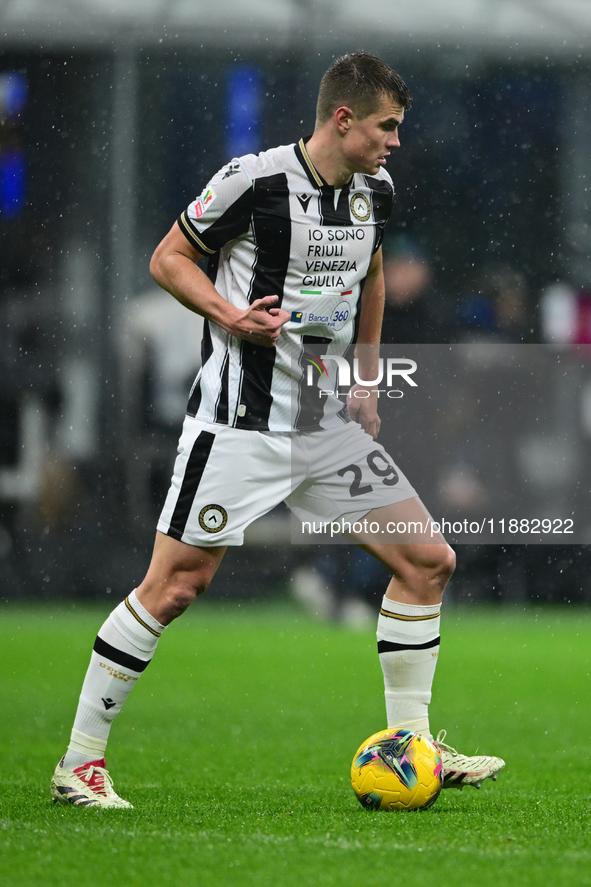 Jaka Bijol of Udinese Calcio is in action during the Coppa Italia Frecciarossa match between Inter Milan and Udinese Calcio at Giuseppe Meaz...