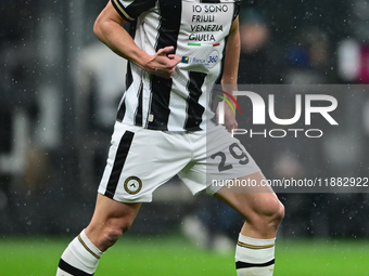 Jaka Bijol of Udinese Calcio is in action during the Coppa Italia Frecciarossa match between Inter Milan and Udinese Calcio at Giuseppe Meaz...