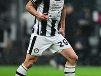 Jaka Bijol of Udinese Calcio is in action during the Coppa Italia Frecciarossa match between Inter Milan and Udinese Calcio at Giuseppe Meaz...