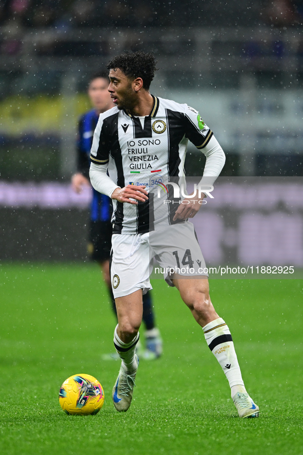 Arthur Atta of Udinese Calcio is in action during the Coppa Italia Frecciarossa match between Inter Milan and Udinese Calcio at Giuseppe Mea...