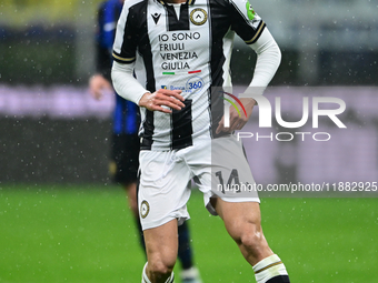 Arthur Atta of Udinese Calcio is in action during the Coppa Italia Frecciarossa match between Inter Milan and Udinese Calcio at Giuseppe Mea...