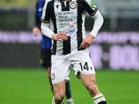 Arthur Atta of Udinese Calcio is in action during the Coppa Italia Frecciarossa match between Inter Milan and Udinese Calcio at Giuseppe Mea...