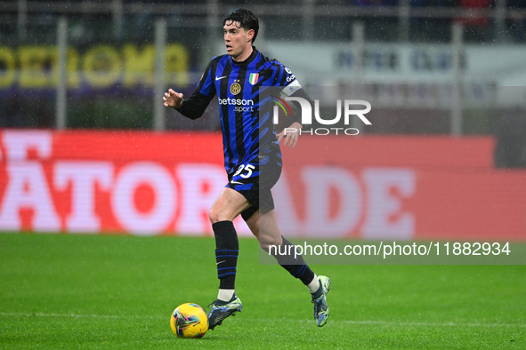 Alessandro Bastoni of Inter Milan is in action during the Coppa Italia Frecciarossa match between Inter Milan and Udinese Calcio at Giuseppe...