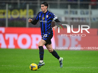 Alessandro Bastoni of Inter Milan is in action during the Coppa Italia Frecciarossa match between Inter Milan and Udinese Calcio at Giuseppe...