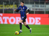 Alessandro Bastoni of Inter Milan is in action during the Coppa Italia Frecciarossa match between Inter Milan and Udinese Calcio at Giuseppe...