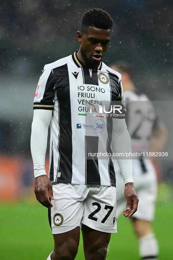 Christian Kabasele of Udinese Calcio looks on during the Coppa Italia Frecciarossa match between Inter Milan and Udinese Calcio at Giuseppe...