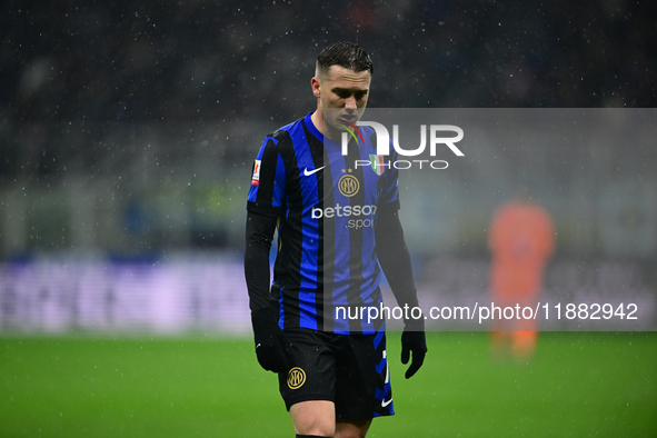 Piotr Zielinski of Inter Milan looks on during the Coppa Italia Frecciarossa match between Inter Milan and Udinese Calcio at Giuseppe Meazza...