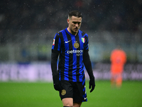 Piotr Zielinski of Inter Milan looks on during the Coppa Italia Frecciarossa match between Inter Milan and Udinese Calcio at Giuseppe Meazza...