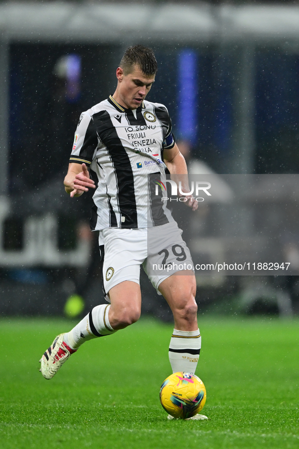 Jaka Bijol of Udinese Calcio is in action during the Coppa Italia Frecciarossa match between Inter Milan and Udinese Calcio at Giuseppe Meaz...