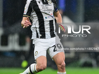 Jaka Bijol of Udinese Calcio is in action during the Coppa Italia Frecciarossa match between Inter Milan and Udinese Calcio at Giuseppe Meaz...