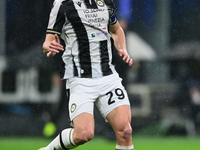 Jaka Bijol of Udinese Calcio is in action during the Coppa Italia Frecciarossa match between Inter Milan and Udinese Calcio at Giuseppe Meaz...