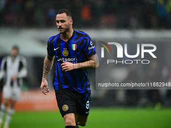 Marko Arnautovic of Inter Milan celebrates after scoring his team's first goal during the Coppa Italia Frecciarossa match between Inter Mila...