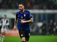 Marko Arnautovic of Inter Milan celebrates after scoring his team's first goal during the Coppa Italia Frecciarossa match between Inter Mila...