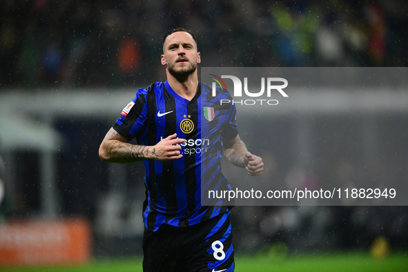 Marko Arnautovic of Inter Milan celebrates after scoring his team's first goal during the Coppa Italia Frecciarossa match between Inter Mila...