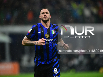 Marko Arnautovic of Inter Milan celebrates after scoring his team's first goal during the Coppa Italia Frecciarossa match between Inter Mila...