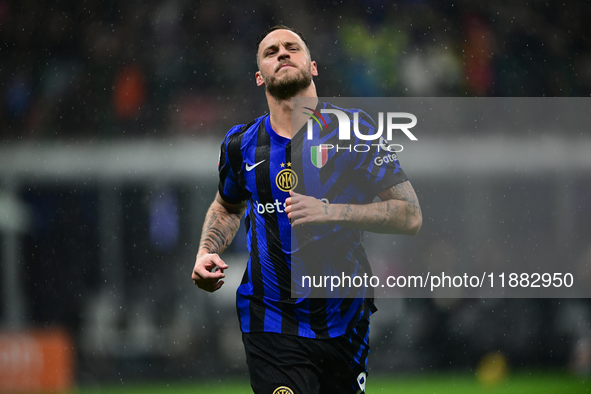 Marko Arnautovic of Inter Milan celebrates after scoring his team's first goal during the Coppa Italia Frecciarossa match between Inter Mila...