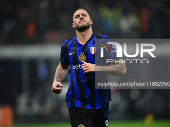 Marko Arnautovic of Inter Milan celebrates after scoring his team's first goal during the Coppa Italia Frecciarossa match between Inter Mila...