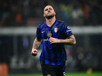 Marko Arnautovic of Inter Milan celebrates after scoring his team's first goal during the Coppa Italia Frecciarossa match between Inter Mila...