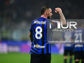 Marko Arnautovic of Inter Milan celebrates after scoring his team's first goal during the Coppa Italia Frecciarossa match between Inter Mila...