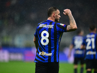 Marko Arnautovic of Inter Milan celebrates after scoring his team's first goal during the Coppa Italia Frecciarossa match between Inter Mila...