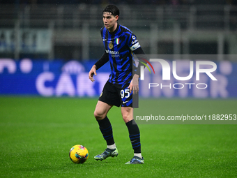 Alessandro Bastoni of Inter Milan is in action during the Coppa Italia Frecciarossa match between Inter Milan and Udinese Calcio at Giuseppe...