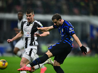 Carlos Augusto of Inter Milan is in action during the Coppa Italia Frecciarossa match between Inter Milan and Udinese Calcio at Giuseppe Mea...