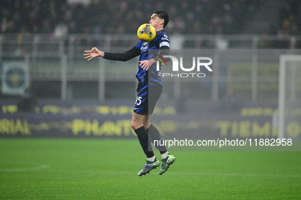 Alessandro Bastoni of Inter Milan is in action during the Coppa Italia Frecciarossa match between Inter Milan and Udinese Calcio at Giuseppe...