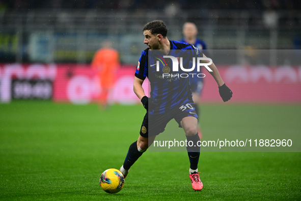 Carlos Augusto of Inter Milan is in action during the Coppa Italia Frecciarossa match between Inter Milan and Udinese Calcio at Giuseppe Mea...