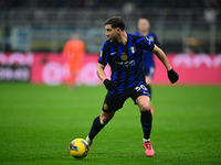 Carlos Augusto of Inter Milan is in action during the Coppa Italia Frecciarossa match between Inter Milan and Udinese Calcio at Giuseppe Mea...